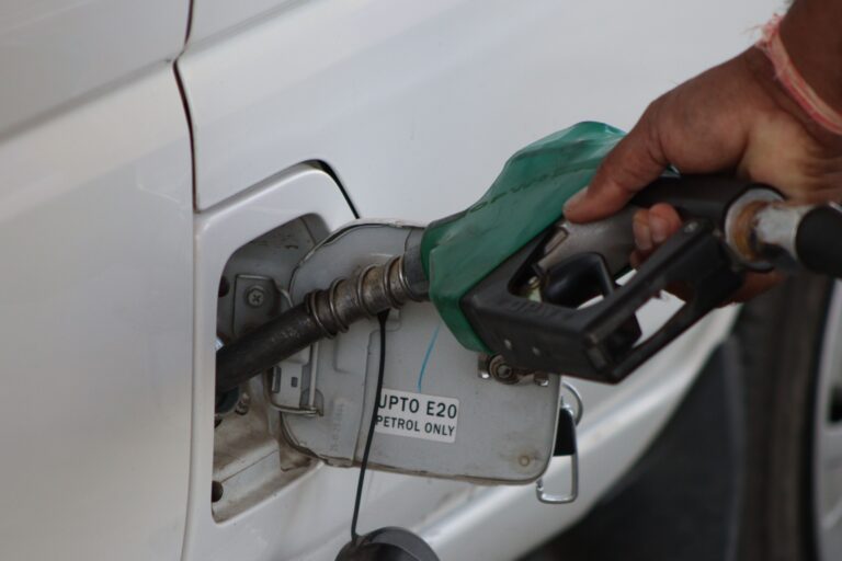 A vehicle being refueled with E20 petrol at a fuel station in India as part of the country's ethanol blending program.