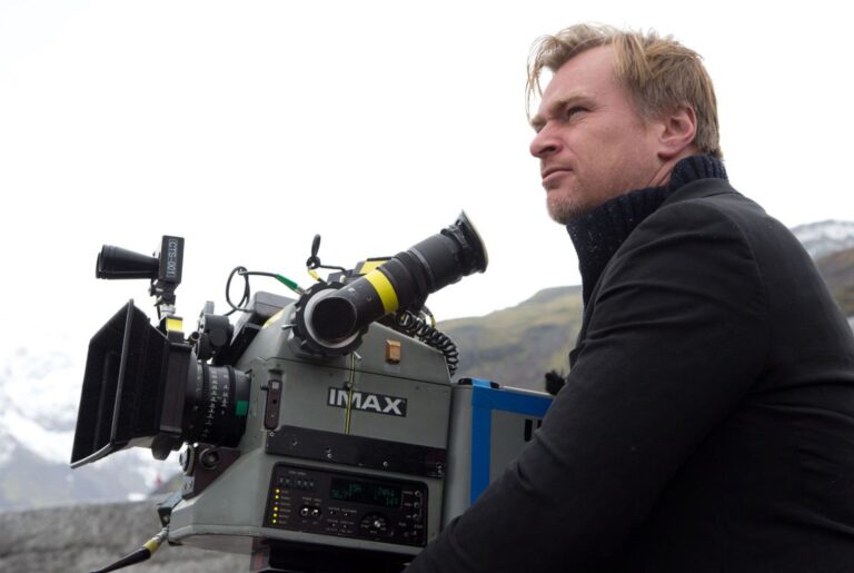 Christopher Nolan operating an IMAX camera during film production.