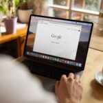 Person using Google Search on a laptop, illustrating how AI powered search is changing website traffic in the zero click economy.