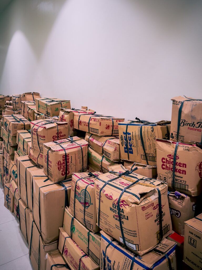Large pile of packages in an ecommerce returns warehouse
