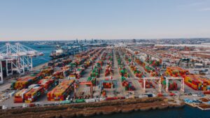 Large container port showing global shipping, logistics infrastructure, and international supply chains.