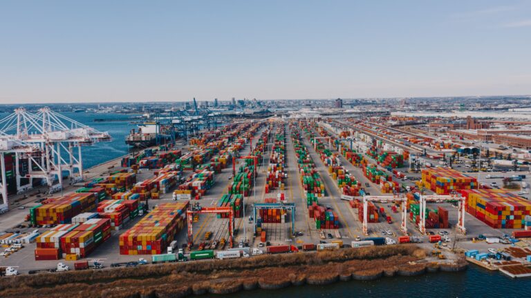 Large container port showing global shipping, logistics infrastructure, and international supply chains.