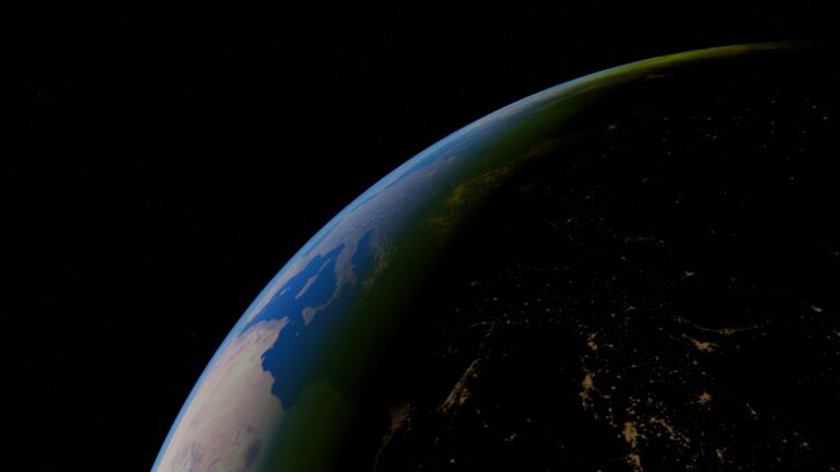 Earth seen from space at night with illuminated areas along the planet's surface