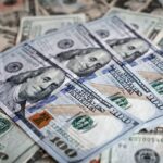 US dollar banknotes representing global finance and currency dominance
