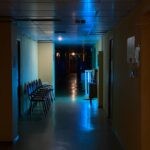Dark hospital corridor illustrating patient safety risks and medical harm