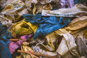 Pile of discarded textiles and fabric waste