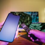 Smartphone and remote control used with connected home electronics