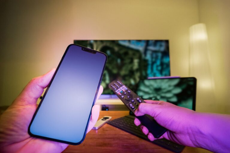 Smartphone and remote control used with connected home electronics