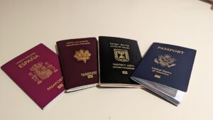 Spanish, French, Israeli and United States passports arranged side by side